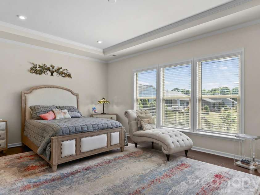 2017 Grove Place, Fort Mill, SC 29715.  MLS# CAR4372923, YatesRealty ID 17957. Primary BR w/tray ceiling overlooks back yard.