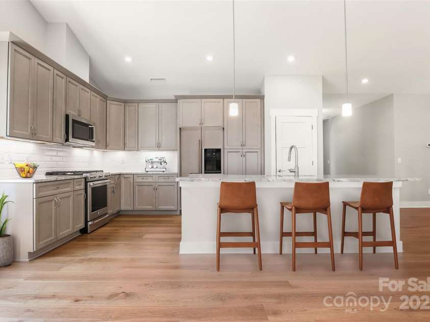 77 Creekside View Drive, Asheville, NC 28804.  MLS# CAR4109113, YatesRealty ID 17957. Virtually staged open concept kitchen.