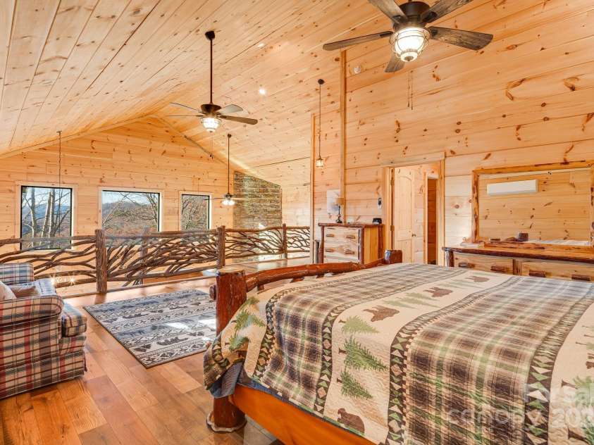 350 Hickory Springs Trail, Bryson City, NC 28713.  MLS# CAR4203007, YatesRealty ID 17958. Main Bedroom loft with ensuite