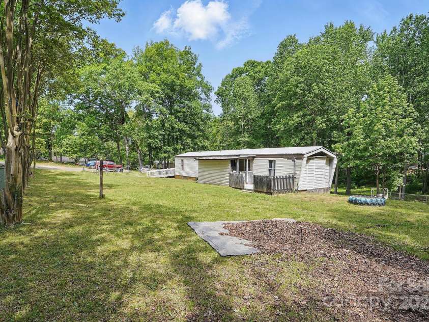 10420 Silver Mine Road, Indian Land, SC 29707.  MLS# CAR4251908, YatesRealty ID 1796. Another view of front yard