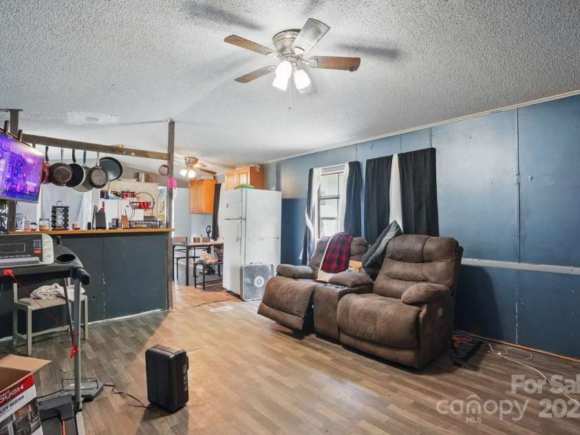 10420 Silver Mine Road, Indian Land, SC 29707.  MLS# CAR4251908, YatesRealty ID 1796. Interior view of Living Room to reference condition