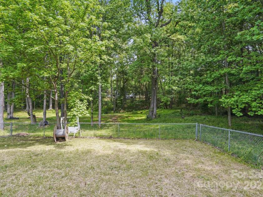 10420 Silver Mine Road, Indian Land, SC 29707.  MLS# CAR4251908, YatesRealty ID 1796. Partially Fenced rear yard