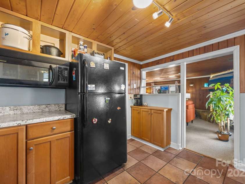 215 Cedar Lane, Arden, NC 28704.  MLS# CAR4224990, YatesRealty ID 1796. Open to the living room.