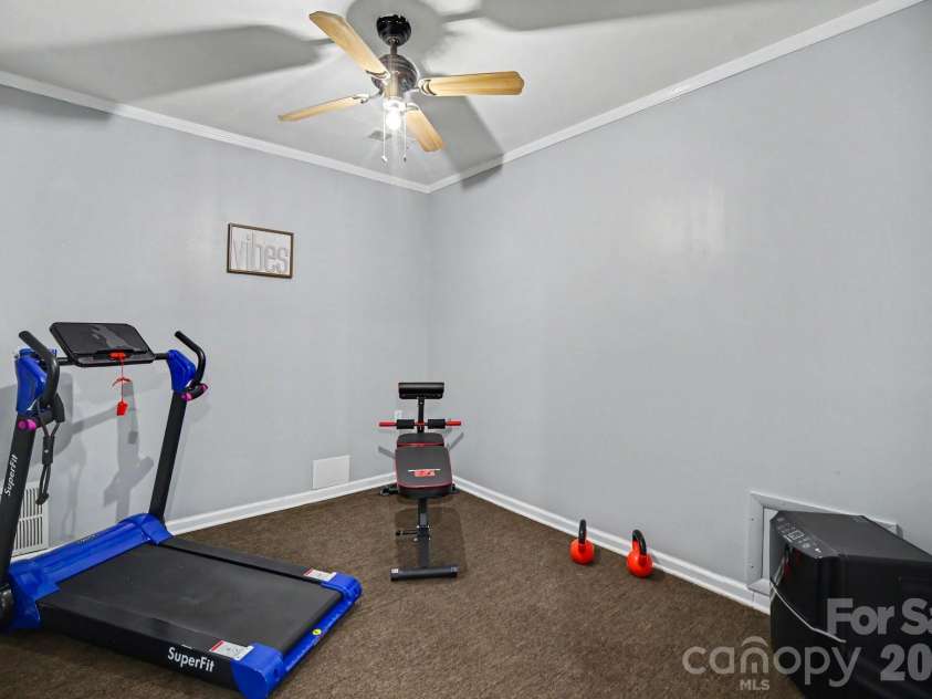 7108 Hollyhouse Drive, Charlotte, NC 28215.  MLS# CAR4366405, YatesRealty ID 17962. BASEMENT FLEX ROOM