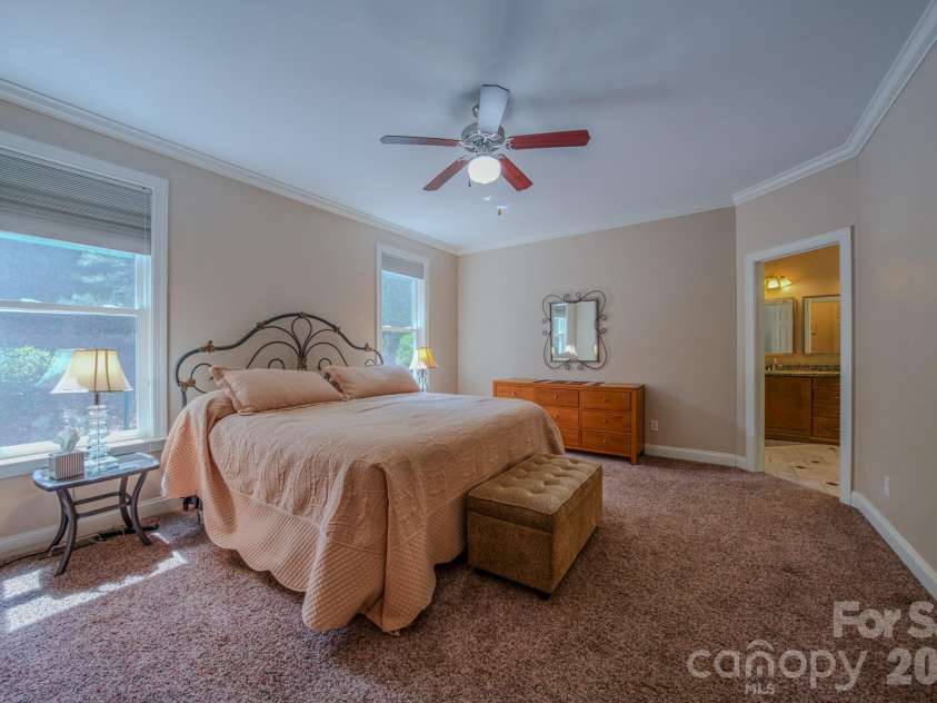 7 Magic Sam Court, Biltmore Lake, NC 28715.  MLS# CAR4374946, YatesRealty ID 17964. Large primary suite with crown moldings