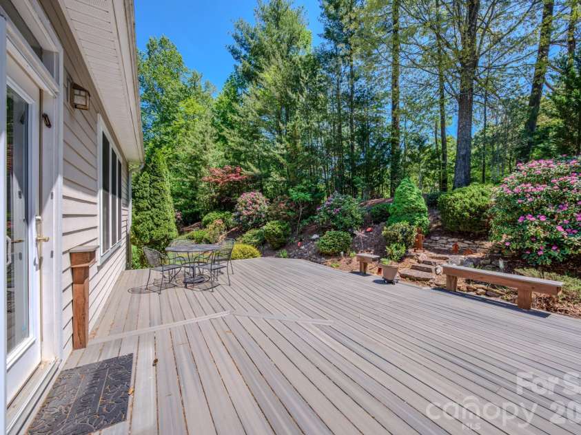 7 Magic Sam Court, Biltmore Lake, NC 28715.  MLS# CAR4374946, YatesRealty ID 17964. Large rear deck with Trex decking and private oasis for a backyard