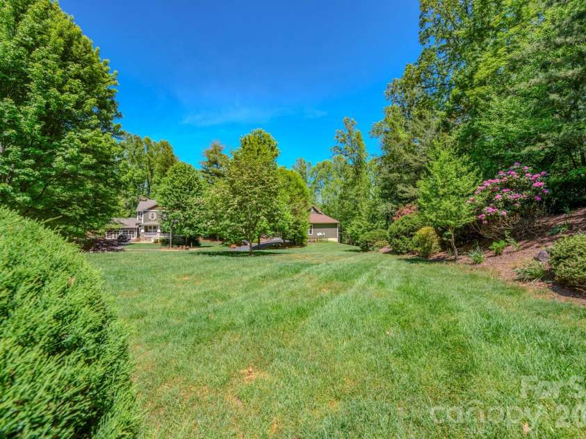 7 Magic Sam Court, Biltmore Lake, NC 28715.  MLS# CAR4374946, YatesRealty ID 17964. Large side yard for pets or gardening