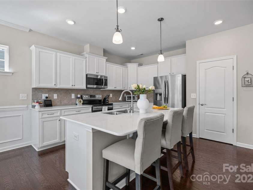 305 Kentmere Lane, Clover, SC 29710.  MLS# CAR4229310, YatesRealty ID 1797. Quartz Top Kitchen / Tile Backsplash / SS Refrigerator Conveys