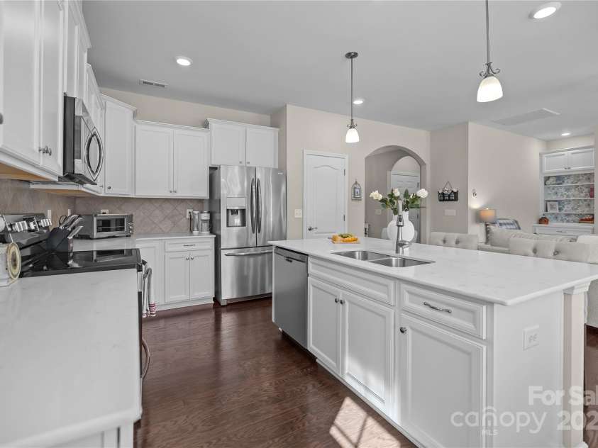 305 Kentmere Lane, Clover, SC 29710.  MLS# CAR4229310, YatesRealty ID 1797. Quartz Top Kitchen / Tile Backsplash / SS Refrigerator Conveys