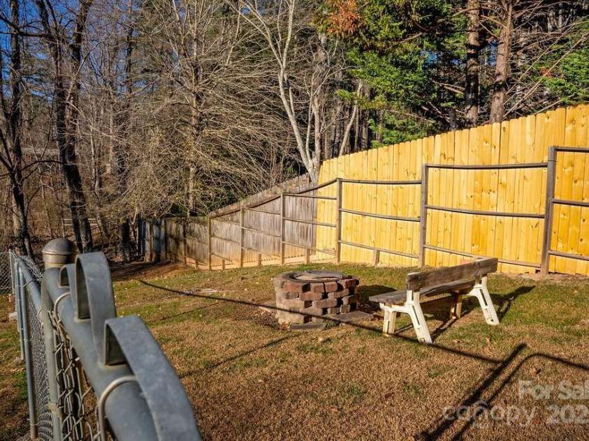 43 Redden Road, Hendersonville, NC 28739.  MLS# CAR4330221, YatesRealty ID 1797. Fire Pit