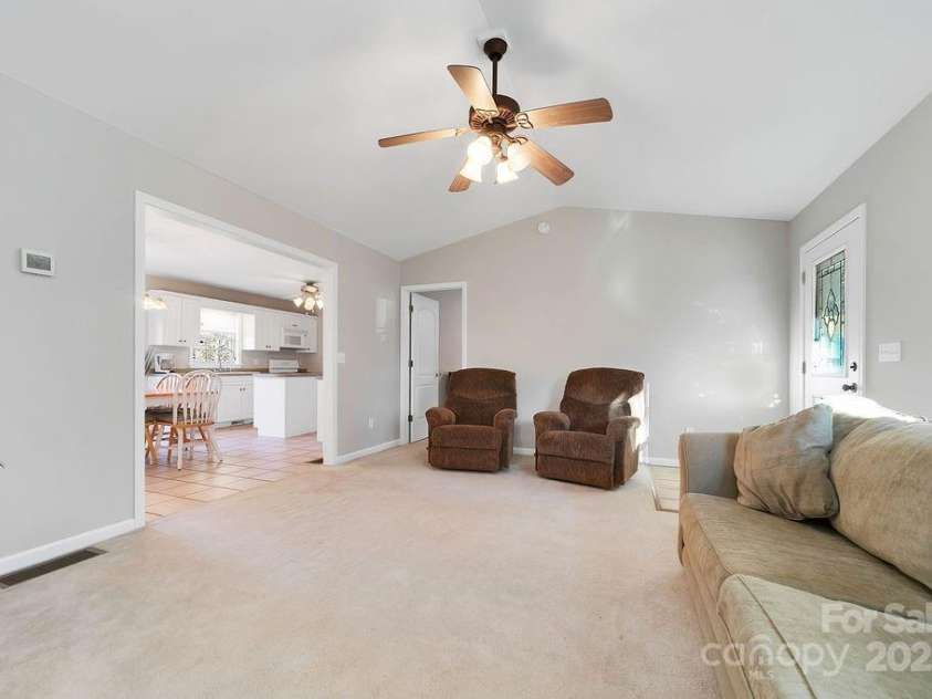 43 Redden Road, Hendersonville, NC 28739.  MLS# CAR4330221, YatesRealty ID 1797. Living Room to Dining