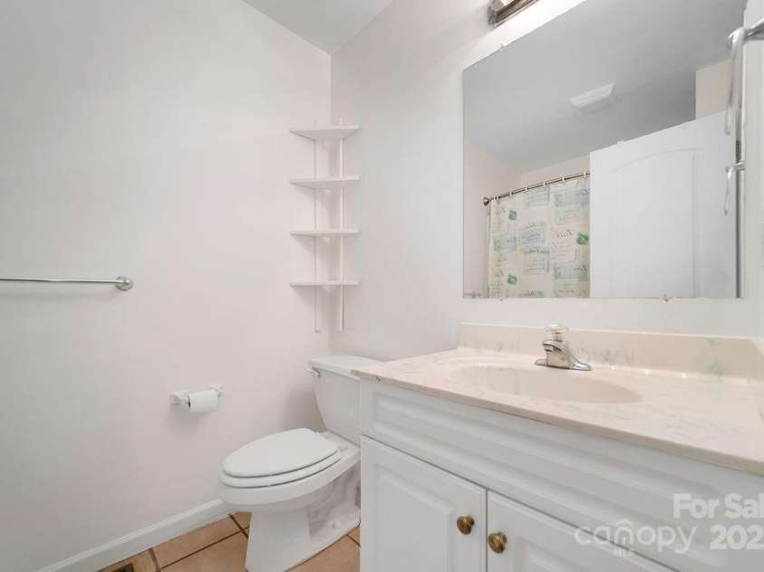 43 Redden Road, Hendersonville, NC 28739.  MLS# CAR4330221, YatesRealty ID 1797. Primary Bath