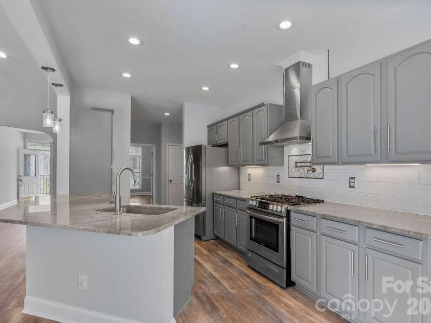 79 Mill Pond Way, Hendersonville, NC 28791.  MLS# CAR4363117, YatesRealty ID 17971. Light filled custom kitchen