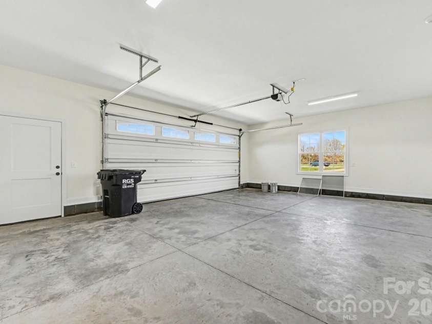 1030 Redbud Way, Salisbury, NC 28147.  MLS# CAR4359503, YatesRealty ID 17980. Garage with entry door