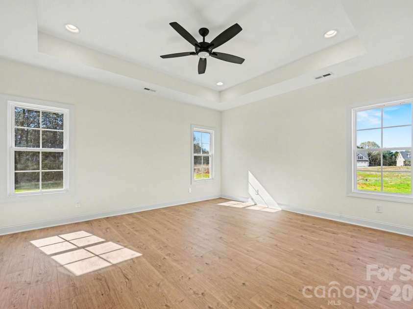 1030 Redbud Way, Salisbury, NC 28147.  MLS# CAR4359503, YatesRealty ID 17980. Primary bedroom with trey ceiling
