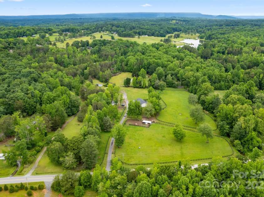 94 Jamestown Lane, Columbus, NC 28722.  MLS# CAR4262620, YatesRealty ID 17982. This horse farm has multiple wells for additional buildings or a riding arena.