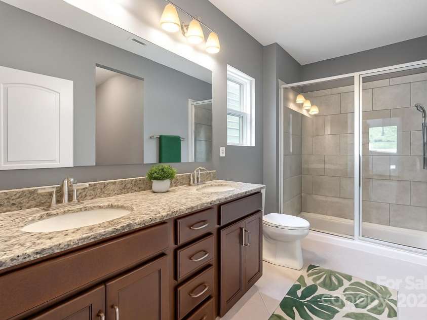 3053 Riker Street, Clover, SC 29710.  MLS# CAR4263946, YatesRealty ID 17984. Virtually Staged Primary Bathroom