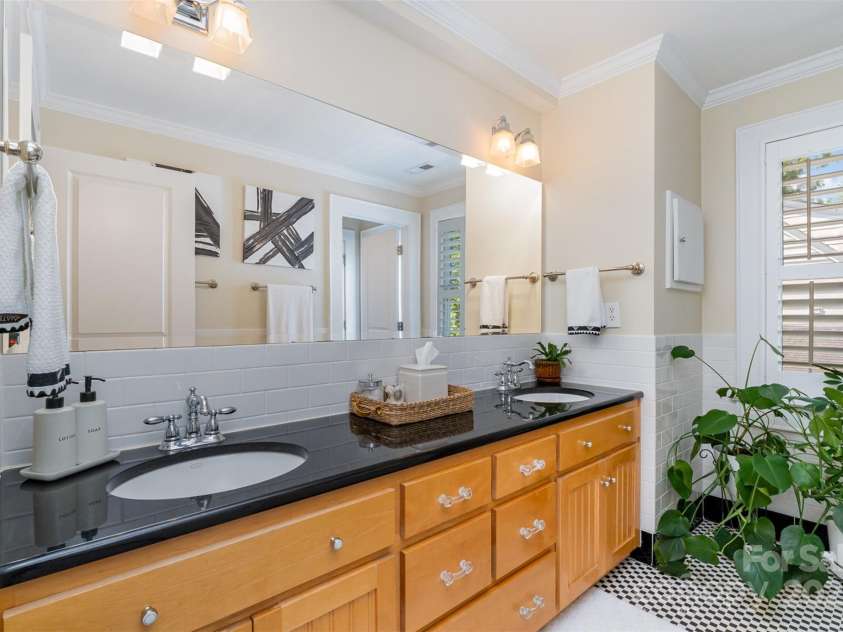 141 Eastover Drive, Concord, NC 28025.  MLS# CAR4264059, YatesRealty ID 17985. Full bathroom upstairs with laundry chute (on the wall)