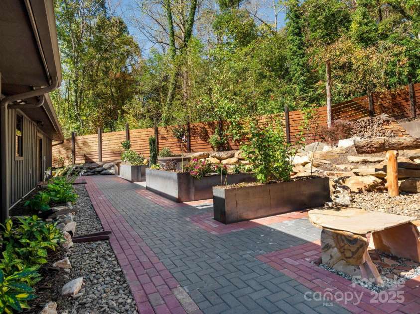 32 Campground Road, Asheville, NC 28805.  MLS# CAR4191816, YatesRealty ID 17988. Custom metal planters