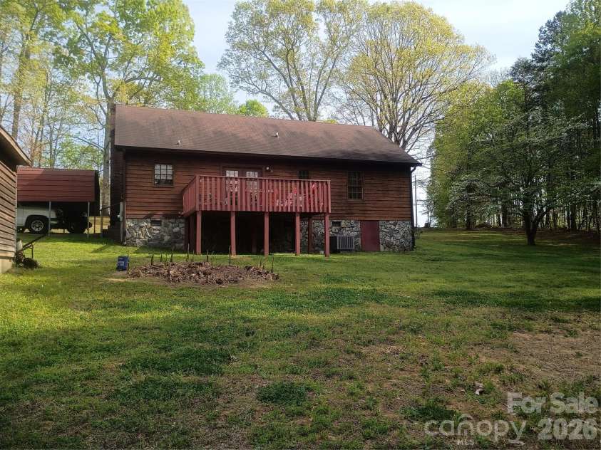 5427 Christopher Road, Iron Station, NC 28080.  MLS# CAR4367845, YatesRealty ID 17988. Back of home