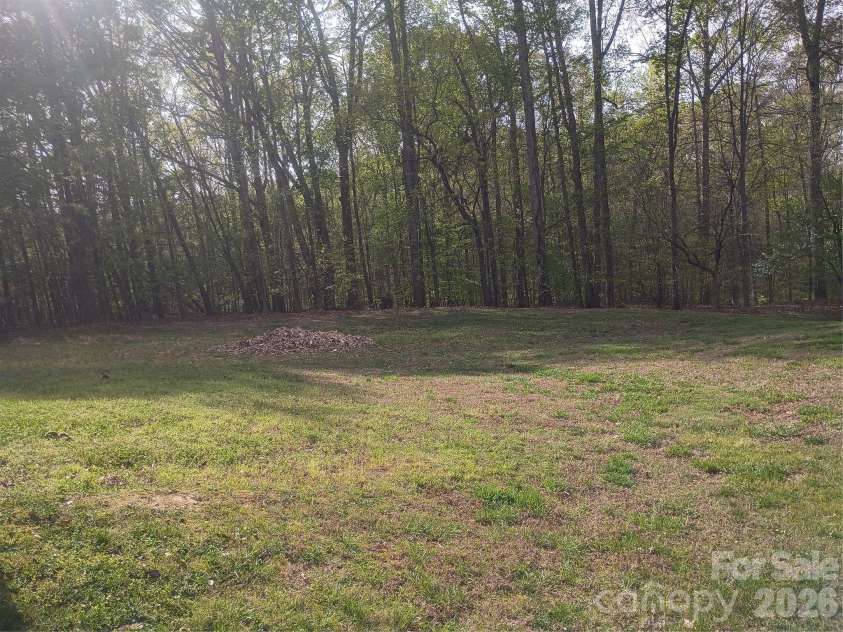 5427 Christopher Road, Iron Station, NC 28080.  MLS# CAR4367845, YatesRealty ID 17988. Backyard