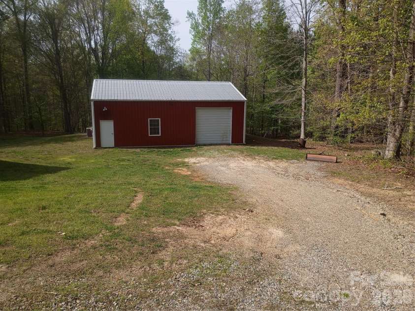 5427 Christopher Road, Iron Station, NC 28080.  MLS# CAR4367845, YatesRealty ID 17988. Garage /Shop