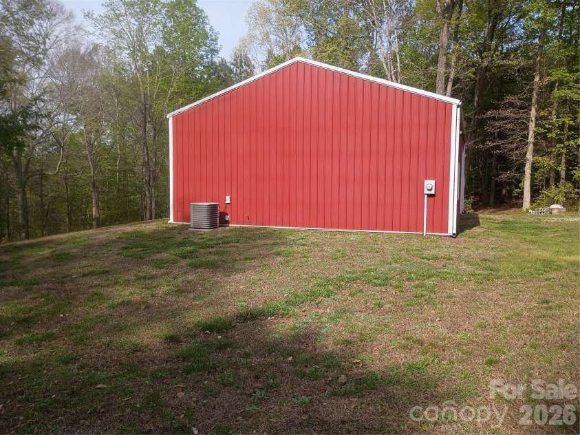 5427 Christopher Road, Iron Station, NC 28080.  MLS# CAR4367845, YatesRealty ID 17988. Side od building