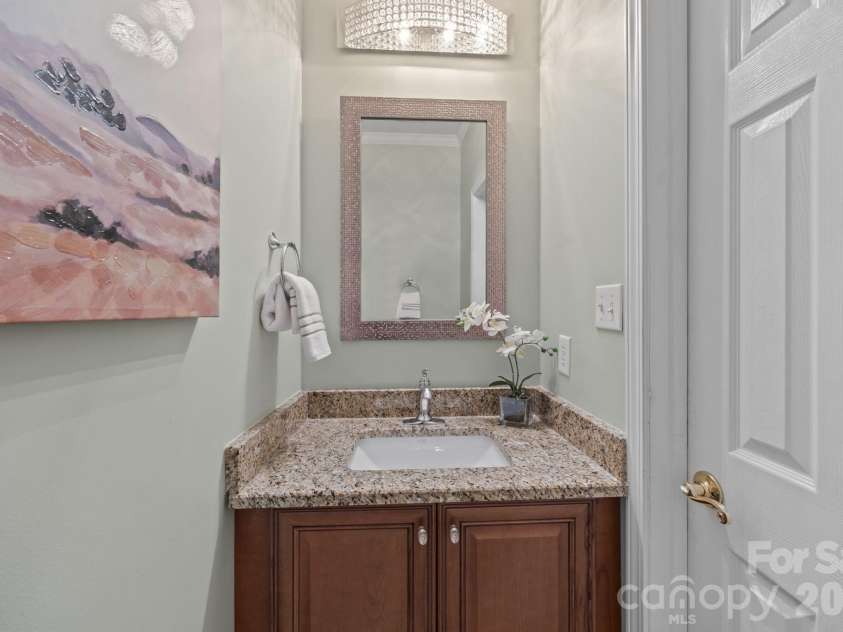 17115 Graves Court, Cornelius, NC 28031.  MLS# CAR4343687, YatesRealty ID 17990. Main floor powder room