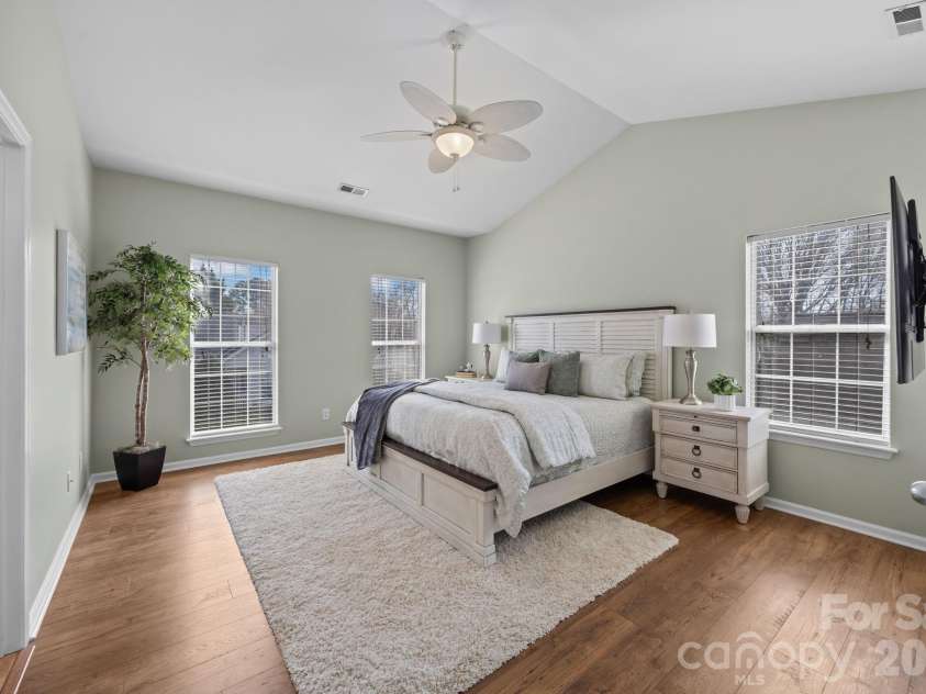 17115 Graves Court, Cornelius, NC 28031.  MLS# CAR4343687, YatesRealty ID 17990. Primary bedroom with vaulted ceilings