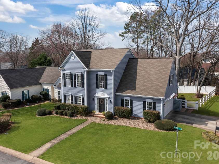 17115 Graves Court, Cornelius, NC 28031.  MLS# CAR4343687, YatesRealty ID 17990. Side load garage