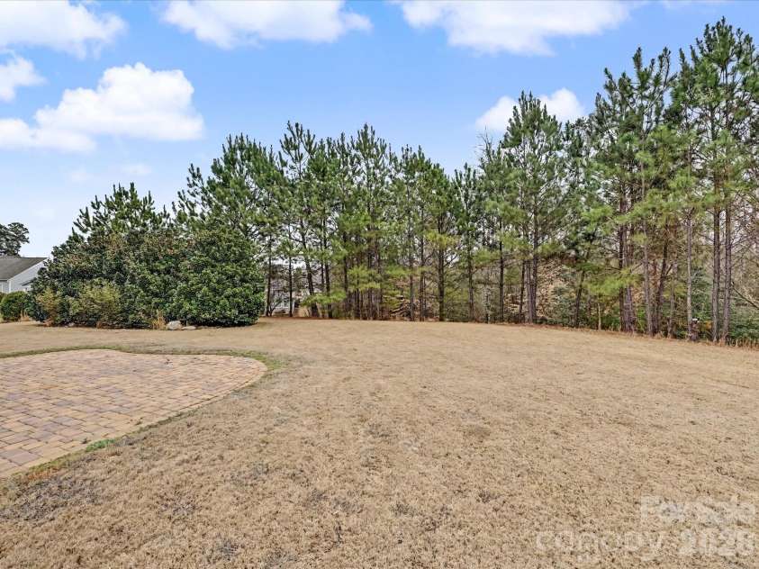 3051 Santee Court, Indian Land, SC 29707.  MLS# CAR4353125, YatesRealty ID 17994. Backyard