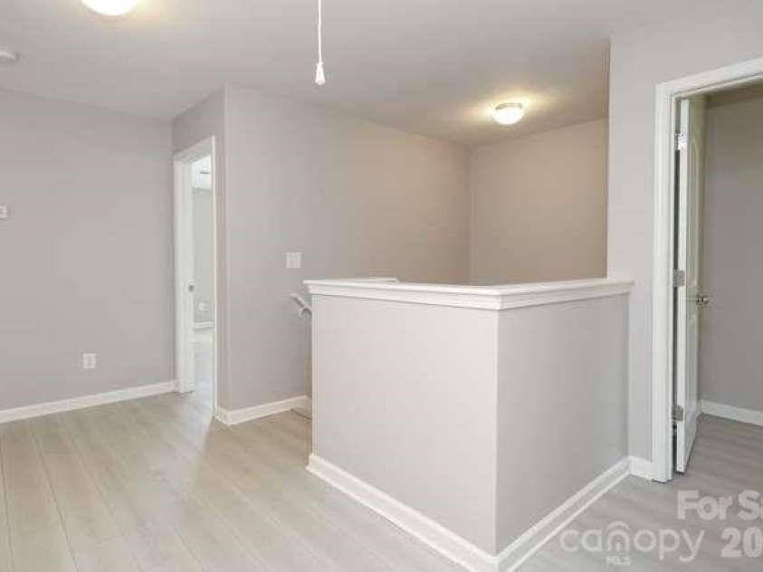 1212 Catawba Run, Lowell, NC 28098.  MLS# CAR4376003, YatesRealty ID 17996. 2nd floor landing area