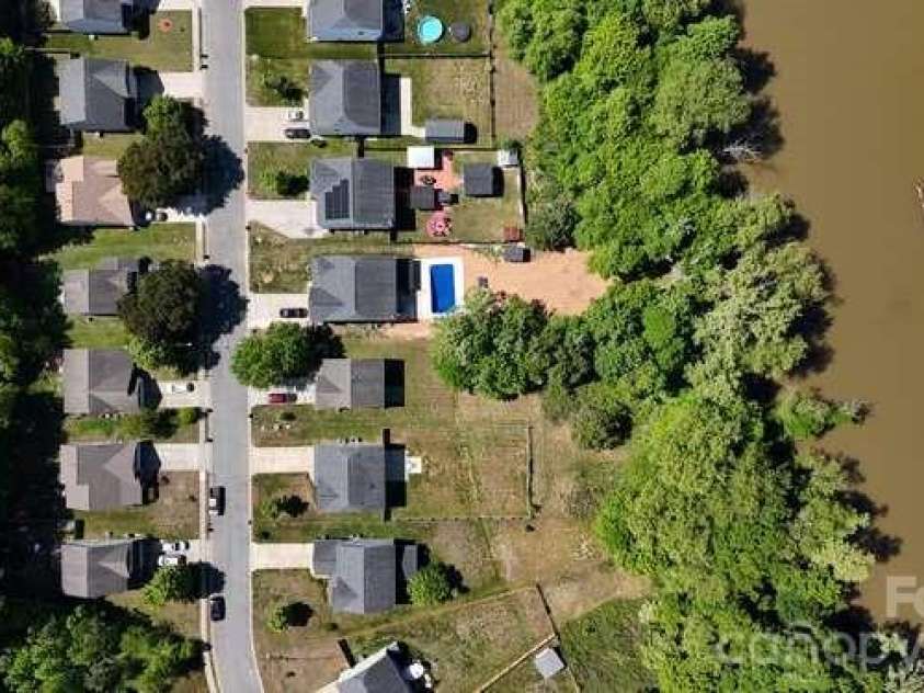 1212 Catawba Run, Lowell, NC 28098.  MLS# CAR4376003, YatesRealty ID 17996. Aerial view if the South Fork Catawba River, which can be accessed from your back yard