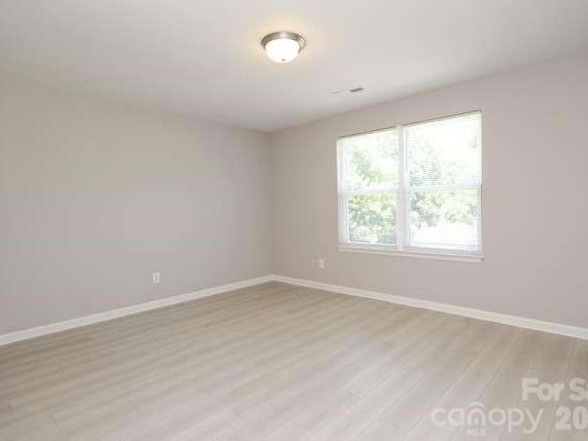 1212 Catawba Run, Lowell, NC 28098.  MLS# CAR4376003, YatesRealty ID 17996. Bedroom 2 with walk in closet