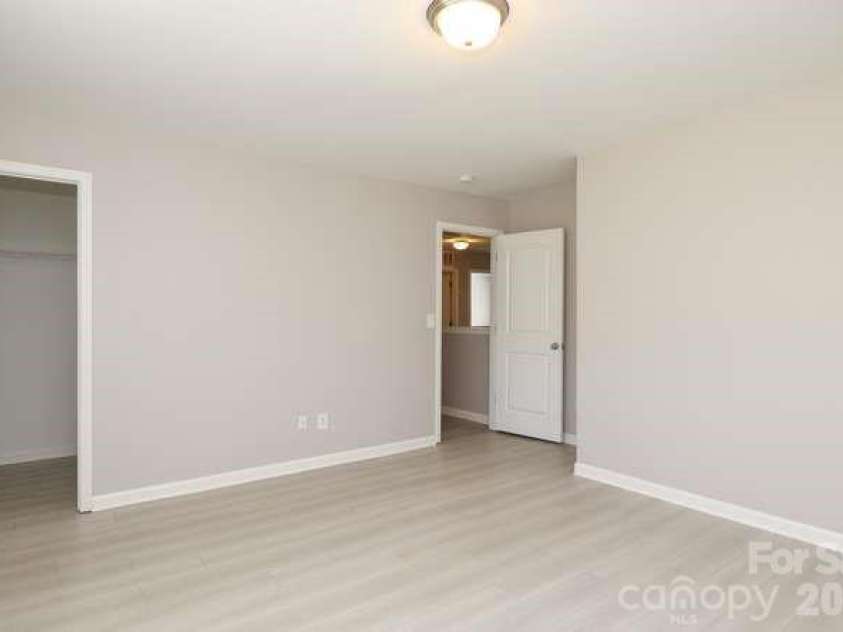 1212 Catawba Run, Lowell, NC 28098.  MLS# CAR4376003, YatesRealty ID 17996. Bedroom 3 with walk in closet