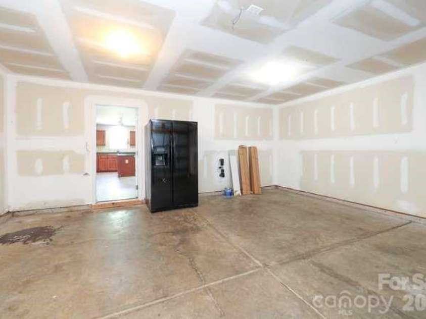 1212 Catawba Run, Lowell, NC 28098.  MLS# CAR4376003, YatesRealty ID 17996. Garage includes refrigerator - sold as-is