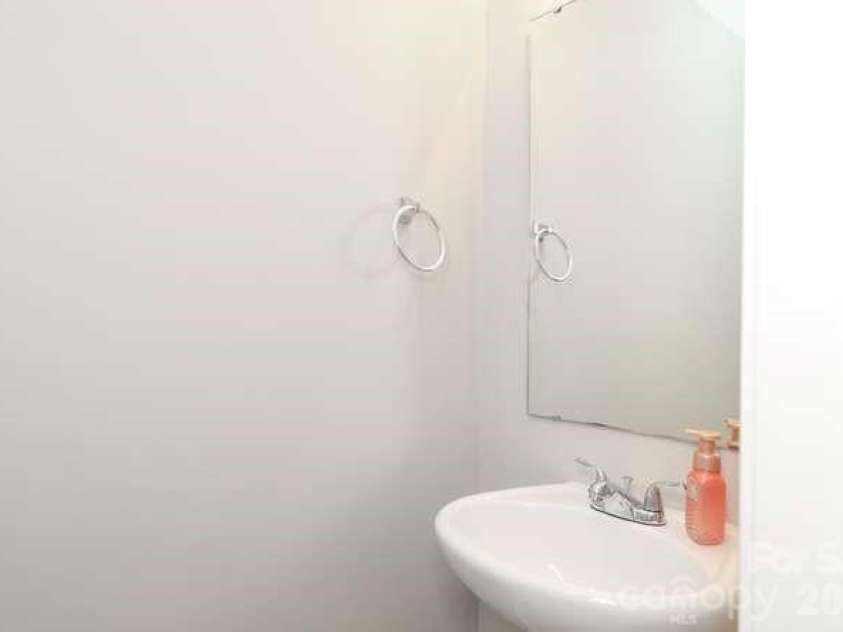 1212 Catawba Run, Lowell, NC 28098.  MLS# CAR4376003, YatesRealty ID 17996. Half Bath on main level, next to kitchen
