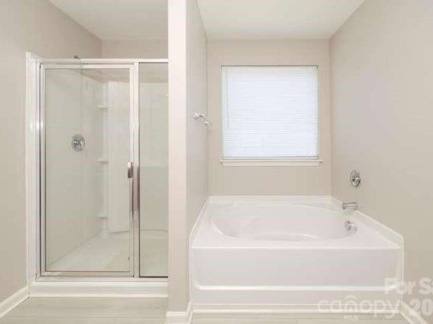 1212 Catawba Run, Lowell, NC 28098.  MLS# CAR4376003, YatesRealty ID 17996. Primary Bathroom with separate tub and shower.
