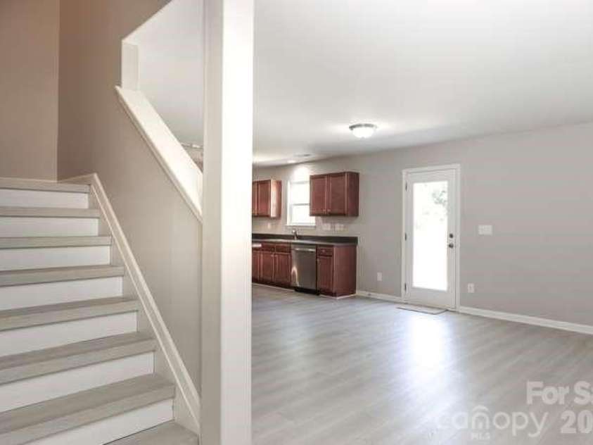1212 Catawba Run, Lowell, NC 28098.  MLS# CAR4376003, YatesRealty ID 17996. Stairs to 2nd floor