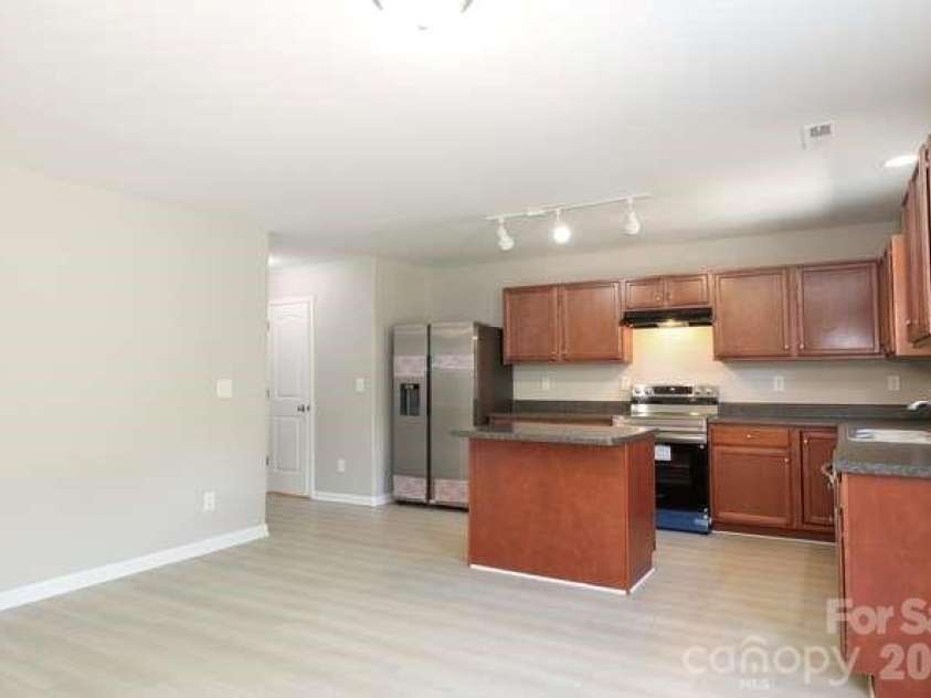 1212 Catawba Run, Lowell, NC 28098.  MLS# CAR4376003, YatesRealty ID 17996. This area could accomodate a breakfast table and chairs.