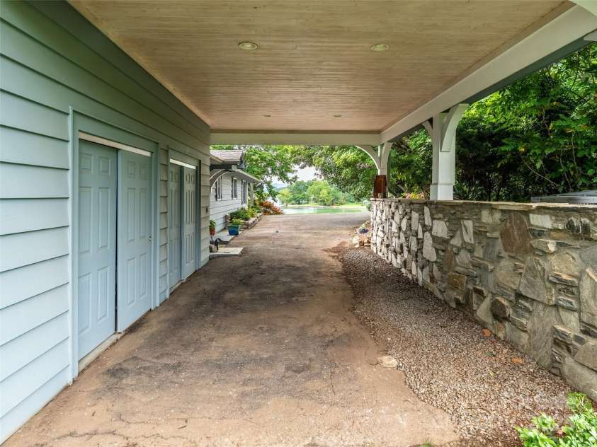 6345 Shore Drive, Nebo, NC 28761.  MLS# CAR4261495, YatesRealty ID 17999. Carport - Two storage closets