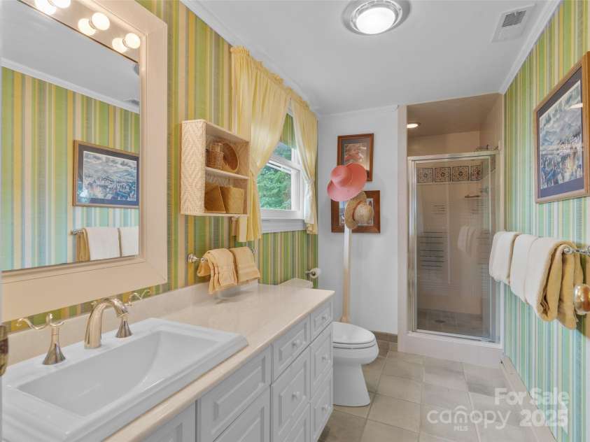 6345 Shore Drive, Nebo, NC 28761.  MLS# CAR4261495, YatesRealty ID 17999. Ensuite Bath