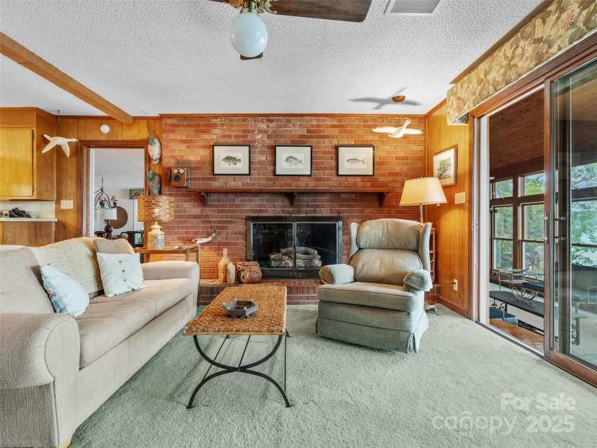 6345 Shore Drive, Nebo, NC 28761.  MLS# CAR4261495, YatesRealty ID 17999. Gas Fireplace