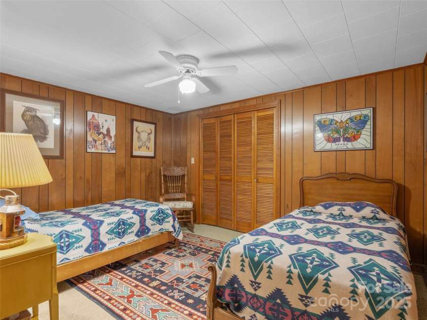 6345 Shore Drive, Nebo, NC 28761.  MLS# CAR4261495, YatesRealty ID 17999. Rec Room back to Kitchen - lower level