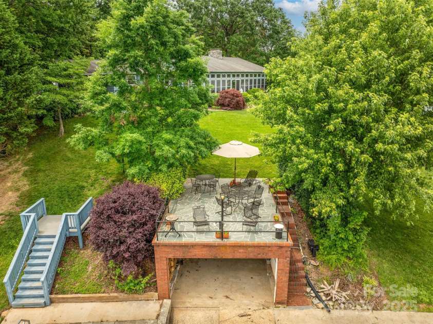 6345 Shore Drive, Nebo, NC 28761.  MLS# CAR4261495, YatesRealty ID 17999. Slip and Boathouse with deck