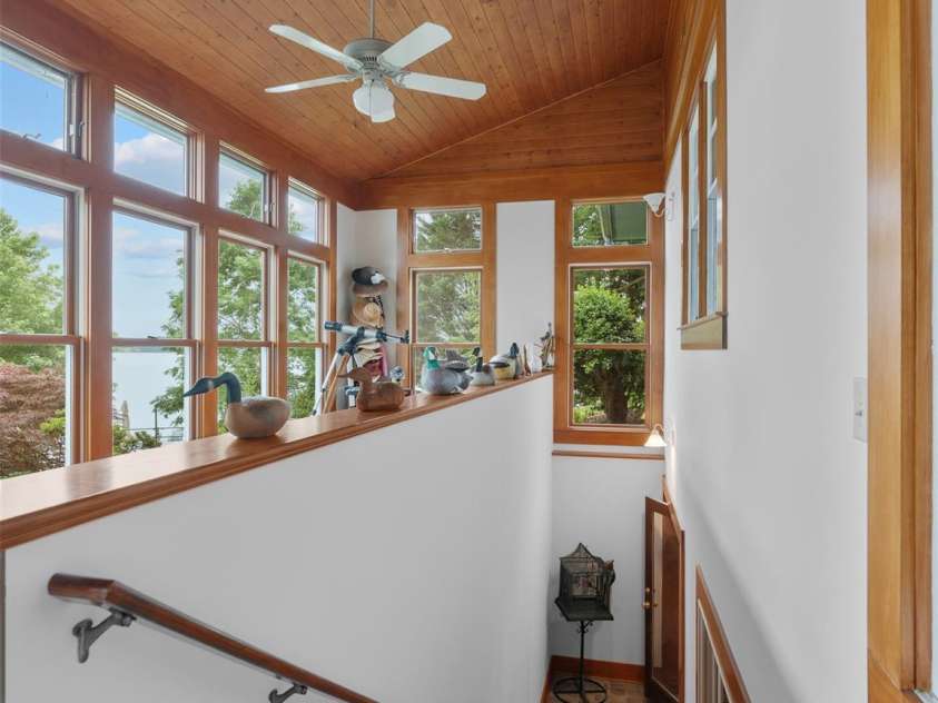 6345 Shore Drive, Nebo, NC 28761.  MLS# CAR4261495, YatesRealty ID 17999. Stairwell off of All Seasons room down to Lower Level