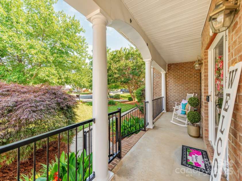 537 Montgrove Place, Concord, NC 28027.  MLS# CAR4266019, YatesRealty ID 18003. Expansive Front Porch