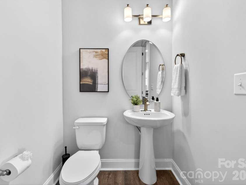 18018 Grey Mossrun Drive, Charlotte, NC 28278.  MLS# CAR4366883, YatesRealty ID 18005. An elegant half bath for visitors