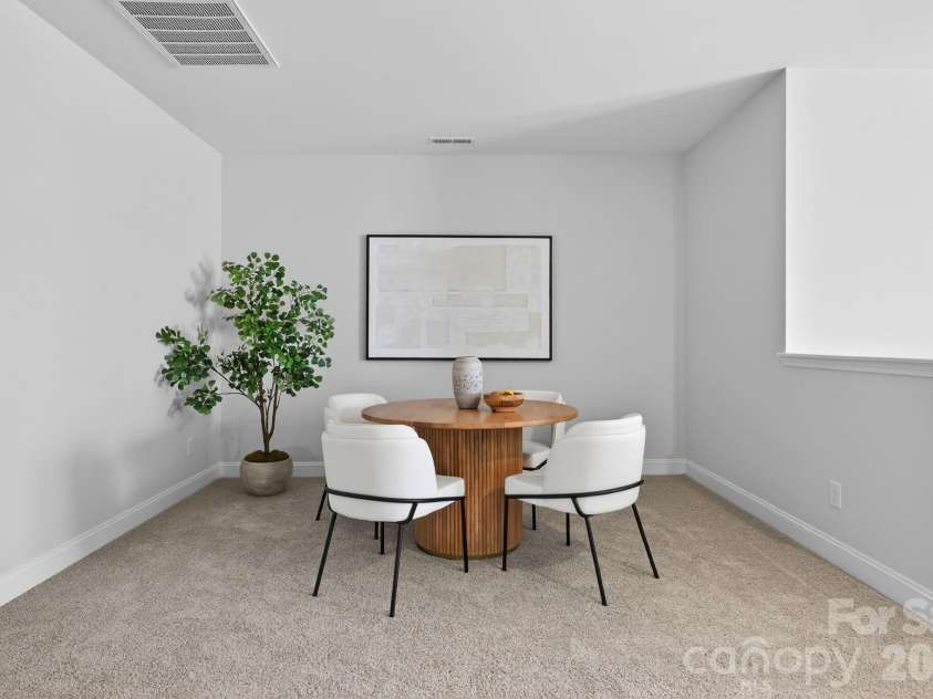 18018 Grey Mossrun Drive, Charlotte, NC 28278.  MLS# CAR4366883, YatesRealty ID 18005. The loft features a gaming alcove or reading nook