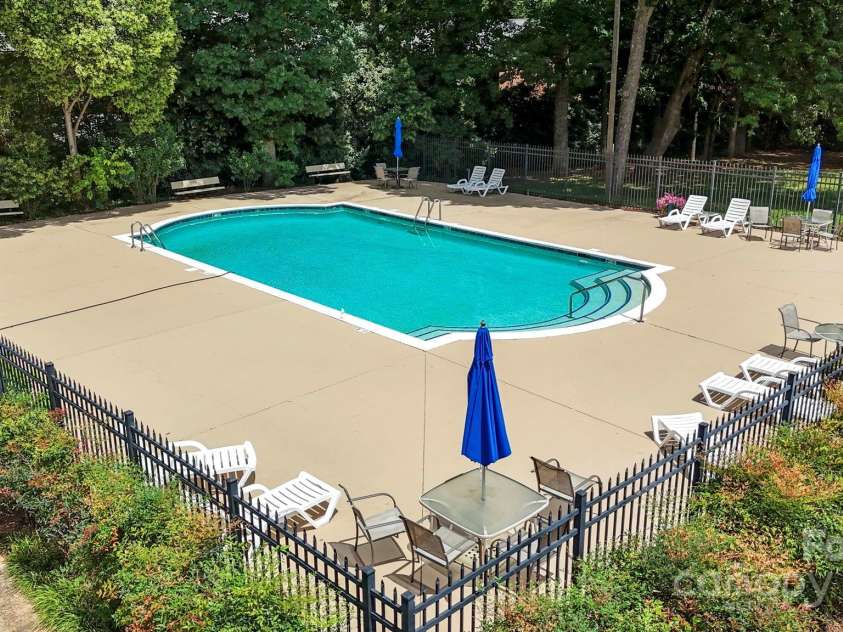 5909 Quail Hollow Road, Charlotte, NC 28210.  MLS# CAR4234664, YatesRealty ID 18007. Sparkling pool for summer fun!